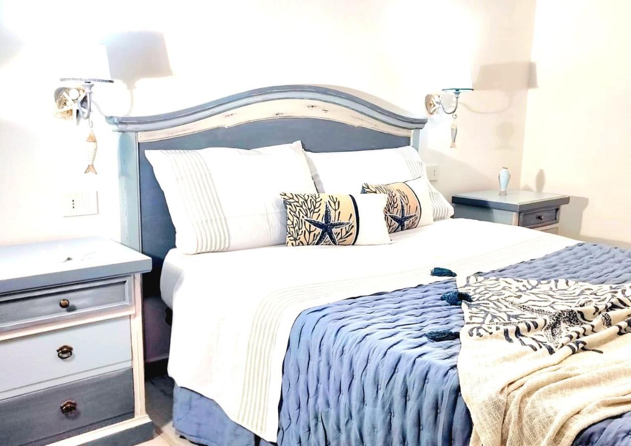 Golden House Hotel Porto Torres Bagian luar foto