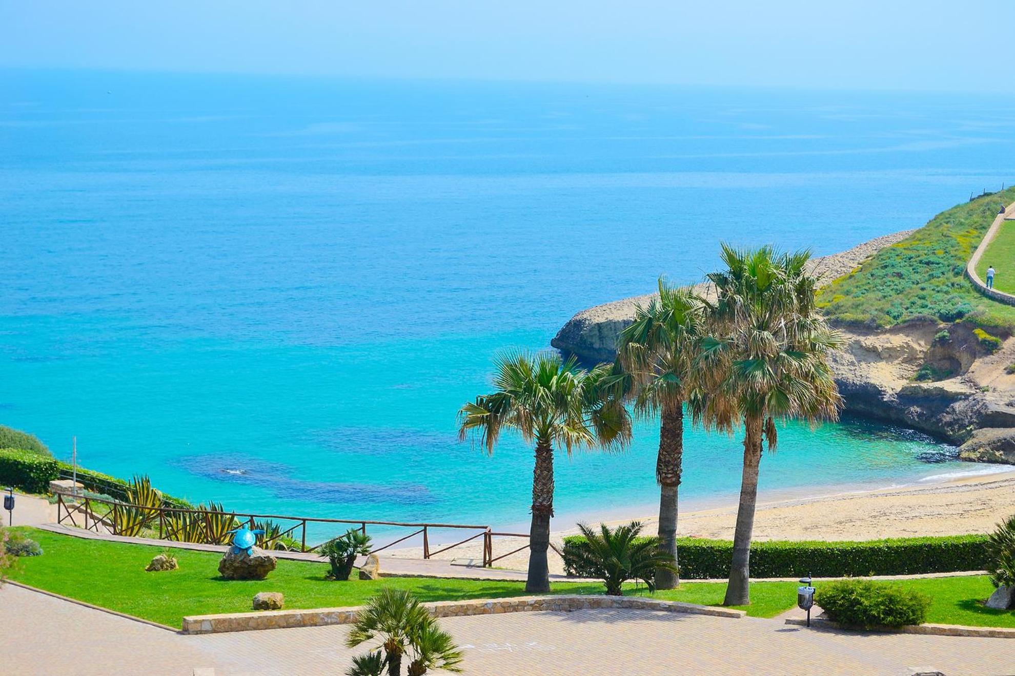 Golden House Hotel Porto Torres Bagian luar foto