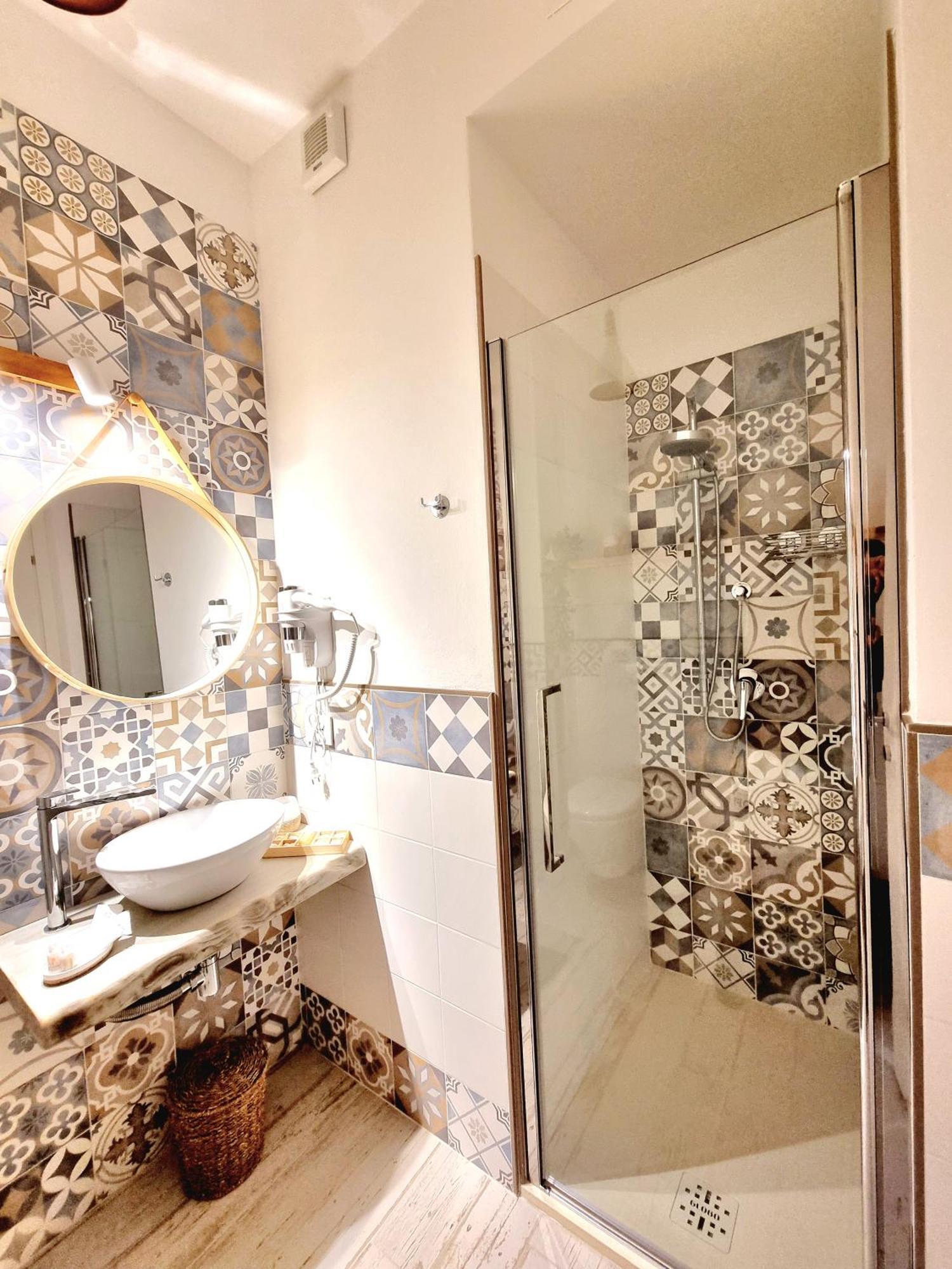 Golden House Hotel Porto Torres Bagian luar foto