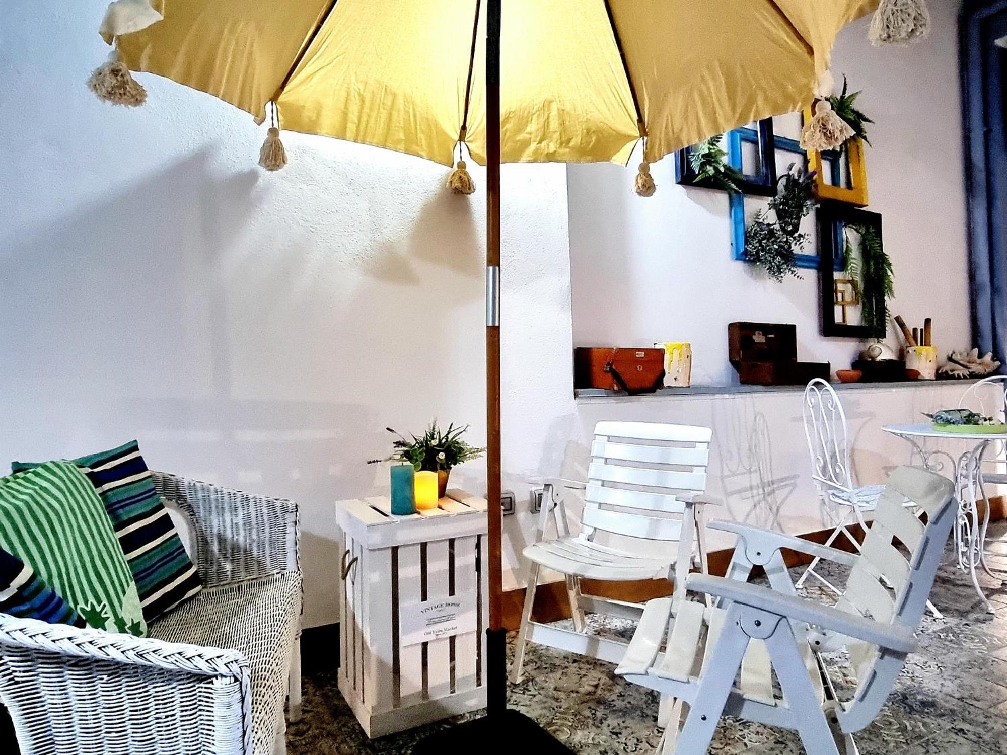 Golden House Hotel Porto Torres Bagian luar foto