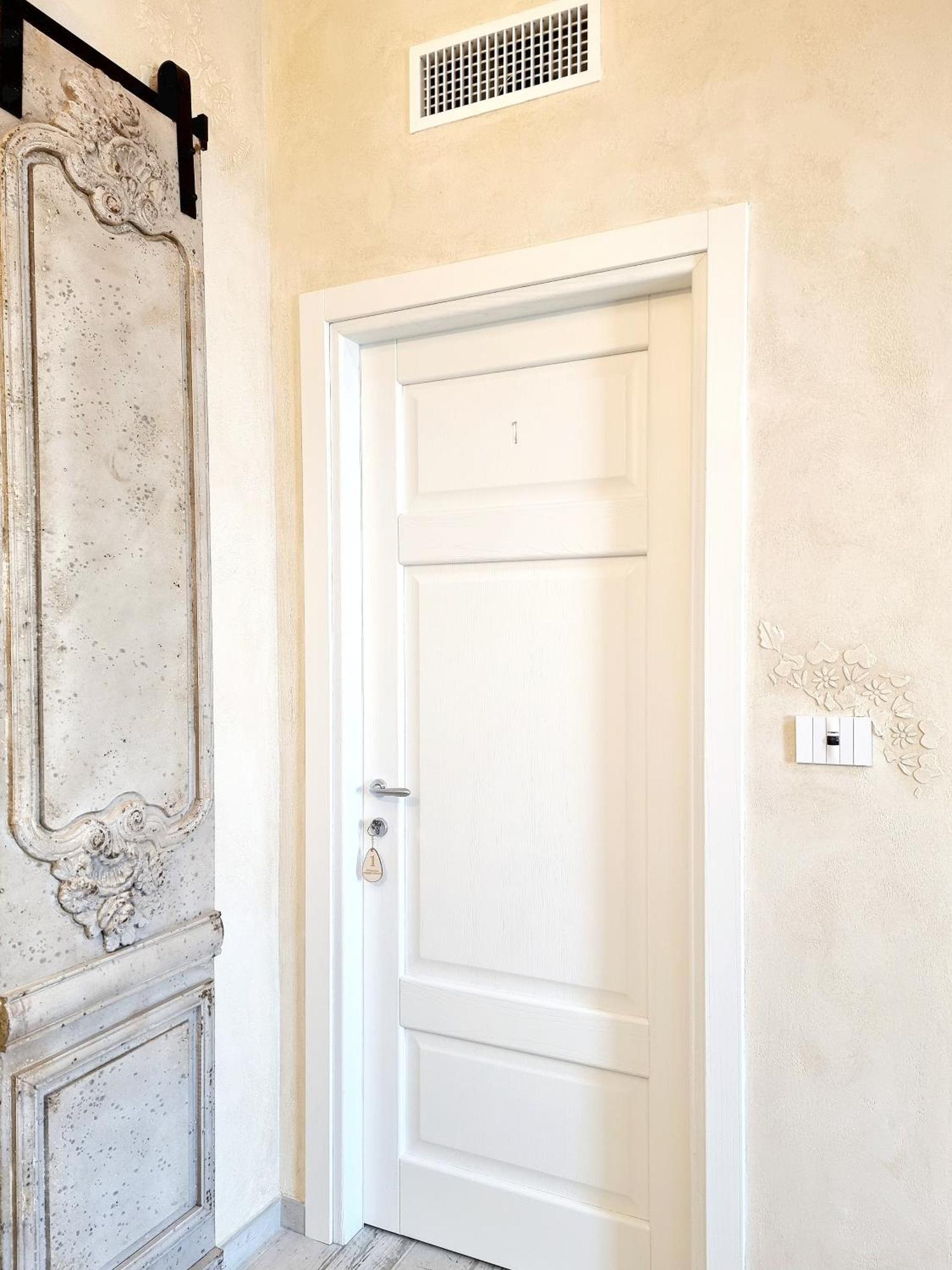 Golden House Hotel Porto Torres Bagian luar foto