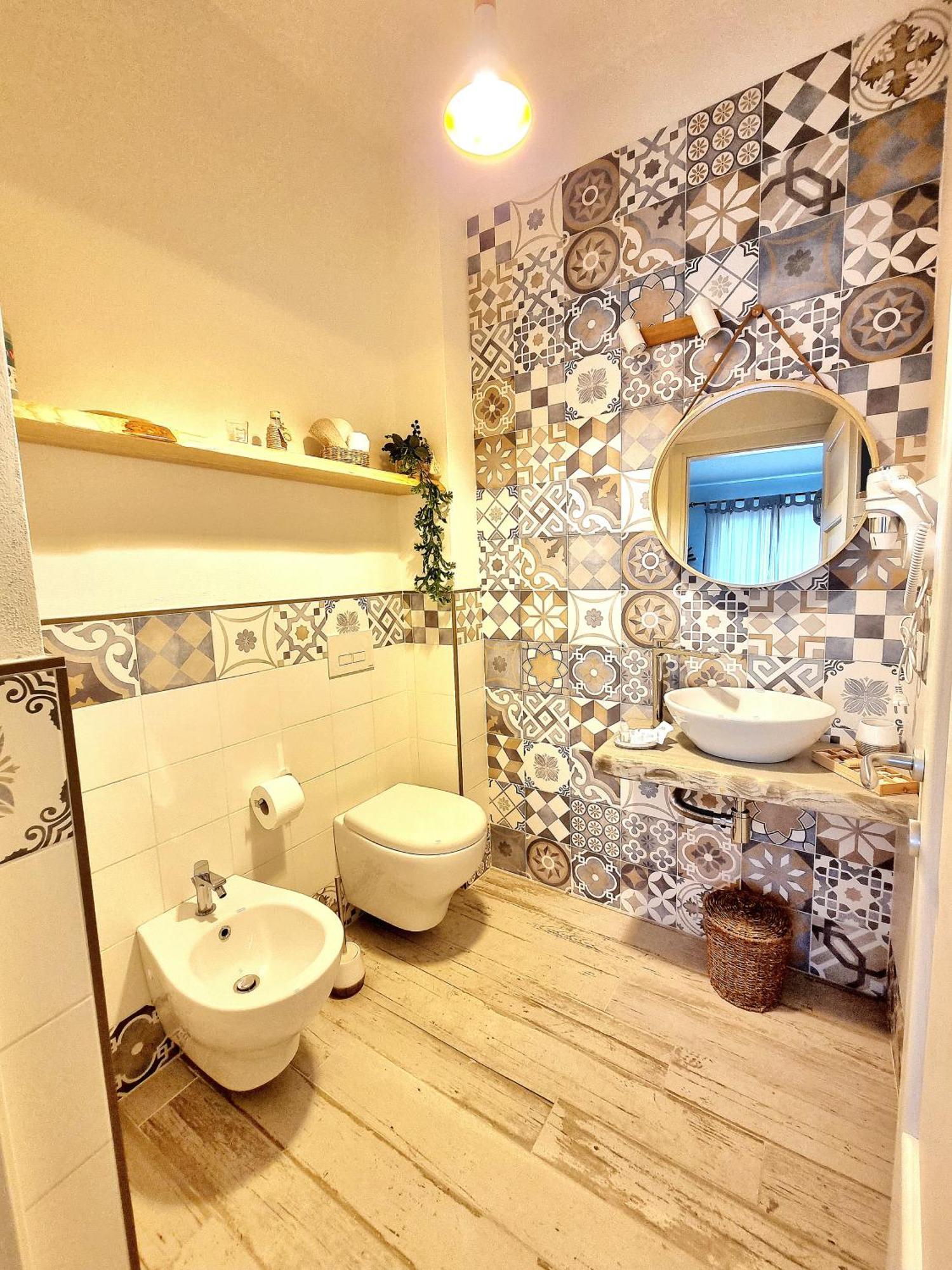 Golden House Hotel Porto Torres Bagian luar foto