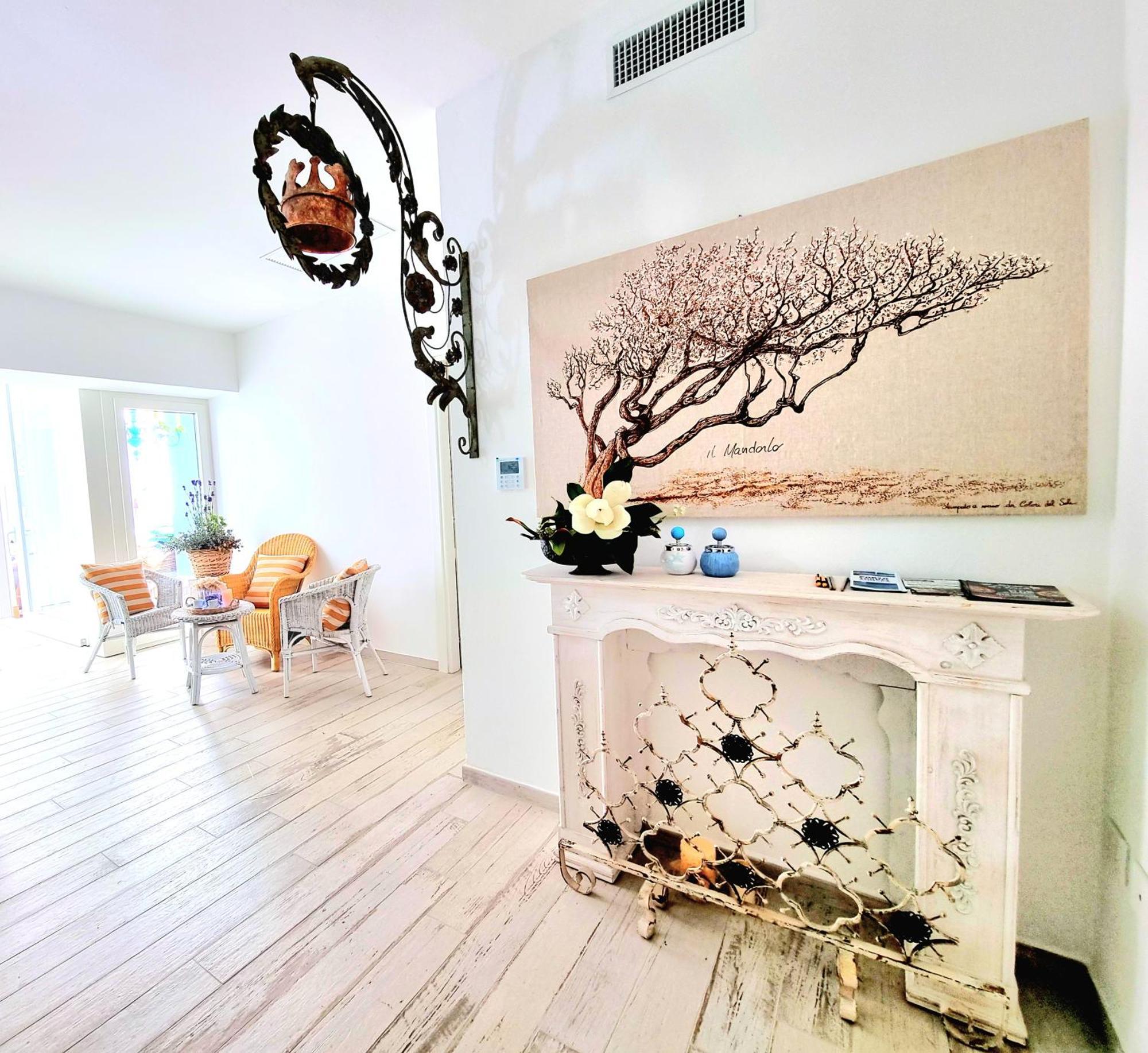 Golden House Hotel Porto Torres Bagian luar foto
